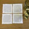 Posavasos blancos calados con bordado blanco