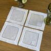 Posavasos blancos calados con bordado blanco